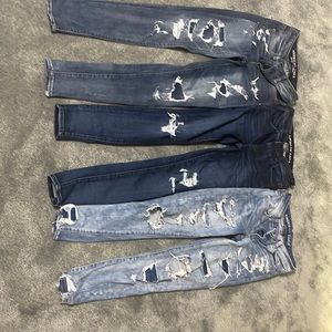 3 pairs of American Eagle patched ripped jeans
